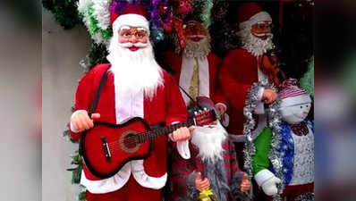 Santa Claus playing guitar, huge Christmas trees in high demand this X-mas 