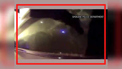 On cam: Cop helps woman escape burning car 