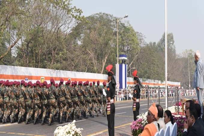 Governor Salutes Marching Soldiers