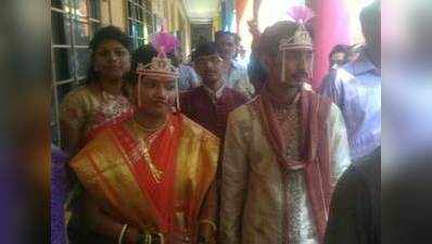 BMC polls: Bride and groom go to polling booth in wedding dress 