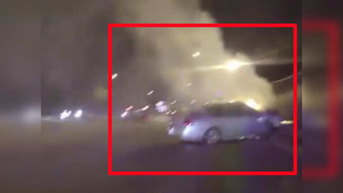 On cam: Cops rescue man from burning car 