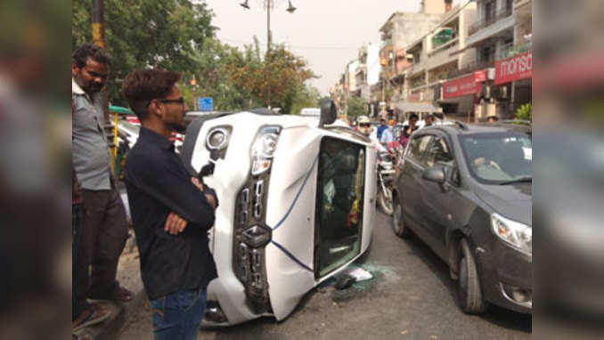 Delhi: Car overturns after ramming into divider in Rajouri Garden 