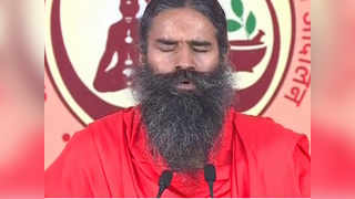 Hundreds followed as Baba Ramdev performed yoga asanas 