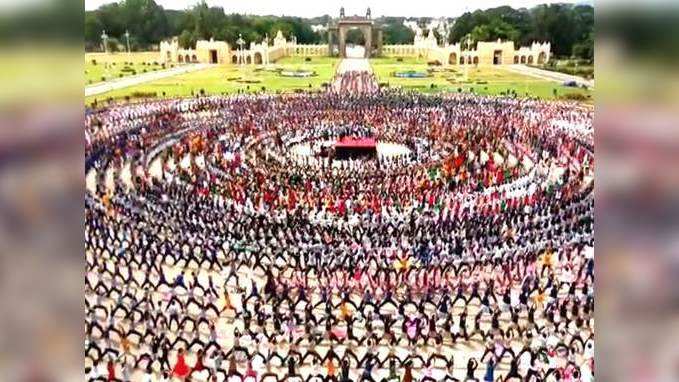 6000 students practice for longest yoga chain at Mysore Palace 