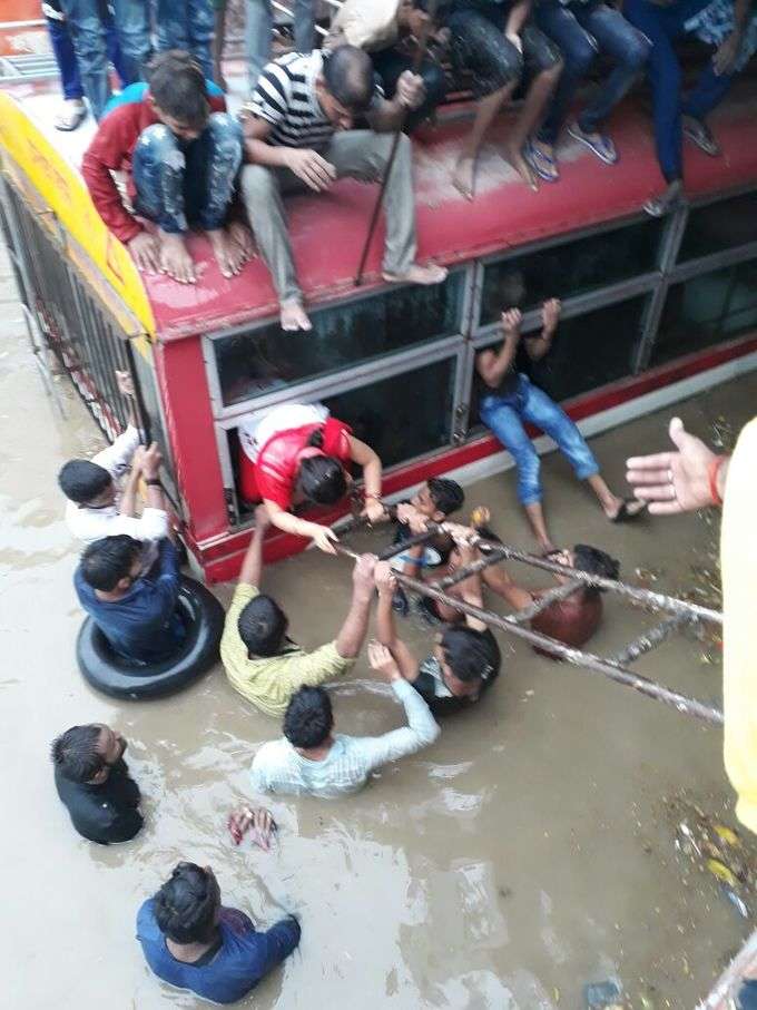 Bus stuck in rain