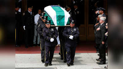 At funeral of slain cop, NYPD seeks protections 