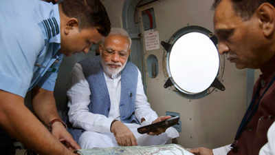 PM Modi undertakes aerial survey of flood-hit Gujarat, announces relief package 