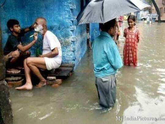 बारिश की ये तस्वीरें कर देंगी आपको लोटपोट! - funny and weird rain photos - Navbharat Times बारिश की ये तस्वीरें कर देंगी आपको लोटपोट! - funny and weird rain photos - Navbharat Times