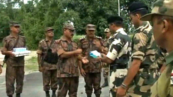 Security forces present sweets to their Bangladeshi counterparts on 70th I-Day 