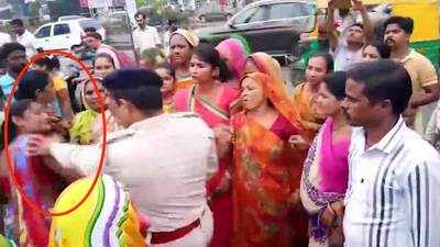 Video: Male police officer pushes, slaps women during anti-encroachment drive 