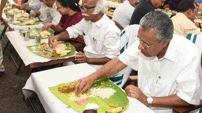 Kerala CM enjoys an exotic ‘sadya’ as part of Onam celebration 