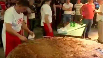 Watch: Serbian barbecue fair grills 65kg burger patty 