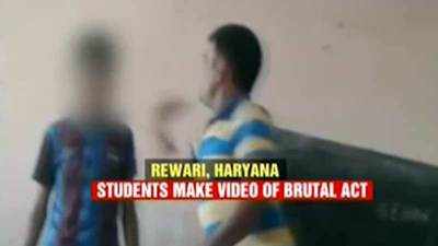 Caught on cam: Teacher thrashes students with slippers 