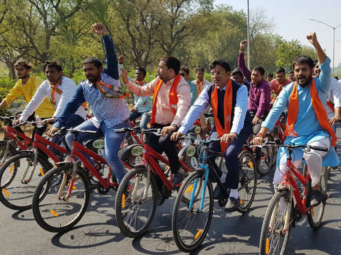 MINISTER ON BICYCLE