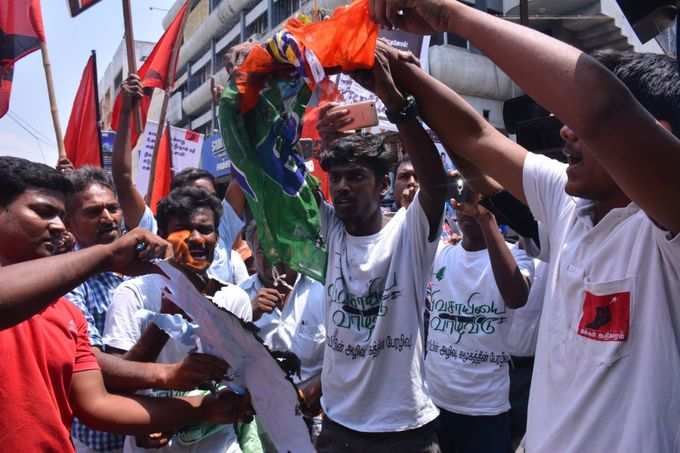 Makkal Adhikaram  members burnt BJP flag in front of Hindi Prachar Sabha Trichy