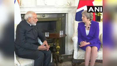 पीएम नरेंद्र मोदी ने ब्रिटिश पीएम टरीजा मे और प्रिंस चार्ल्स से की मुलाकात