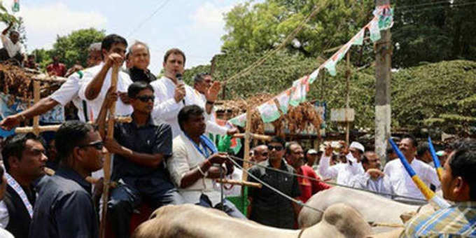 कर्नाटक चुनाव: बैलगाड़ी और साइकल पर चढ़ राहुल गांधी का पीएम मोदी पर वार, क्लिक कर पढ़ें...
