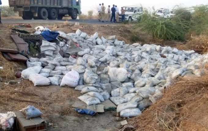 Bavayali: Cement sacks lie as scattered as a truck turned turtle on Bhavnagar