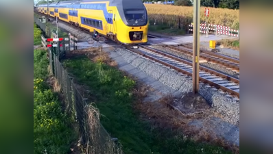 नीदरलैंडः देखें, कैसे साइकलिस्ट ने तेज रफ्तार ट्रेन से बचाई जान