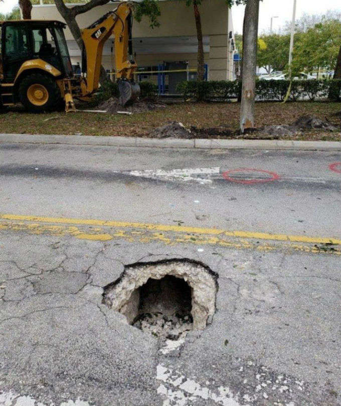 WorkersGo To Repair Sinkhole, Instead Find A Secret Tunnel Leading To A Nearby Bank