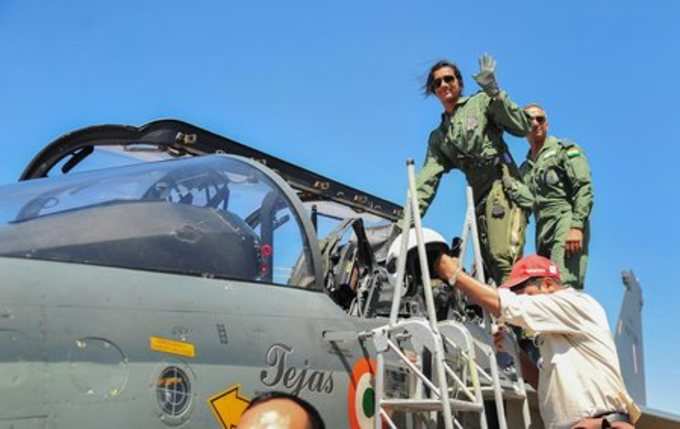 Bengaluru: Badminton player PV Sindhu waves after a sortie in Tejas Aircraft on...