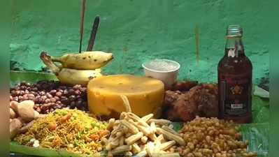 mayana kollai festival :வேலூர், காட்பாடியில் மயான கொள்ளை திருவிழா- கல்லறையில் படையலிட்டு நூதன வழிபாடு