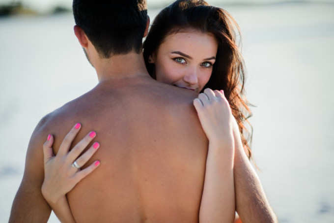 stunning-brunette-hugs-naked-man-holds-her-hands-his-back_8353-1686