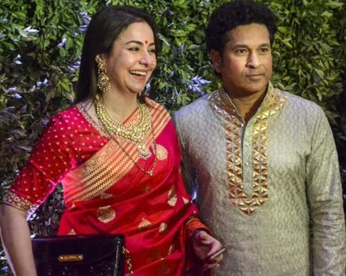 Mumbai: Veteran cricketer Sachin Tendulkar and wife Anjali Tendulkar arrive to a...