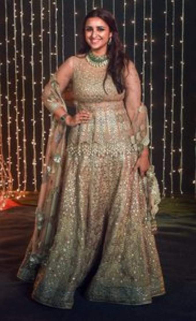 Mumbai: Bollywood actor Parineeti Chopra poses for photos at the wedding recepti...