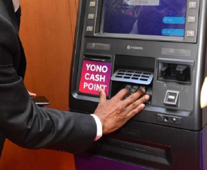 Mr-Rajnish-Kumar-Chairman-SBI-making-transaction-using-Yono-Cash