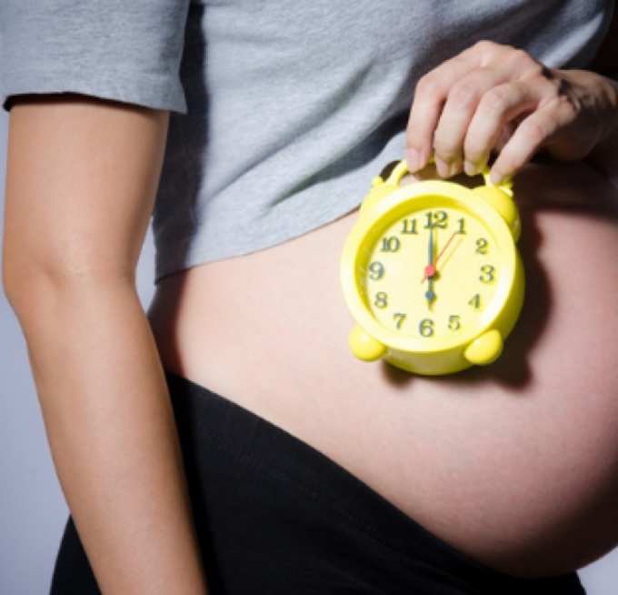 pregnant women speaking with child