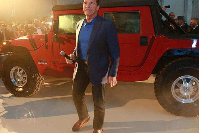 Arnold Schwarzenegger with electric Hummer