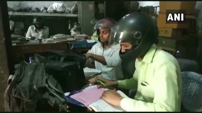 electricity employees wearing helmet
