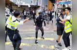 हॉन्ग कॉन्ग : पुलिस फायरिंग, आगजनी और सड़क पर संग्राम
