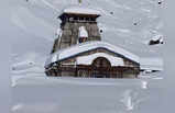 बर्फ में आधा डूबा बाबा केदारनाथ का मंदिर, देखें तस्वीरें