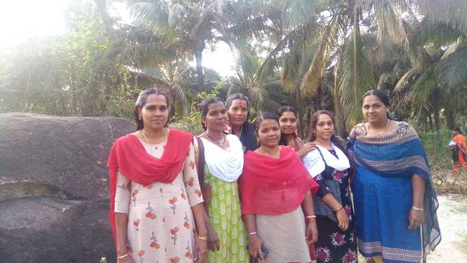 Women coconut tree climbers