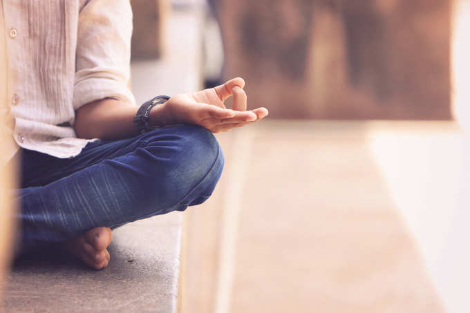 young boy meditating