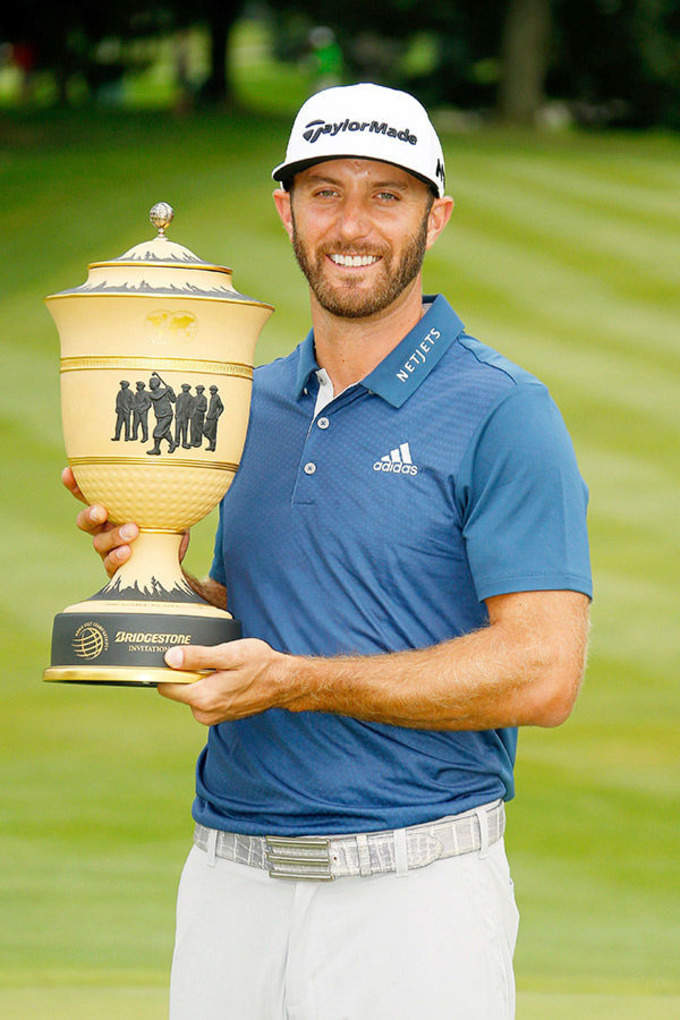 Johnson wins WGC Akron title