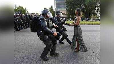 અમેરિકા અશ્વેત પ્રદર્શનઃ પોલીસ સામે ઊભેલી મહિલાની તસવીર સોશિયલ મીડિયા પર છવાઈ