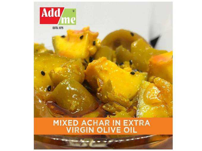 Add me Aam Nimbu Mirch ka Achar