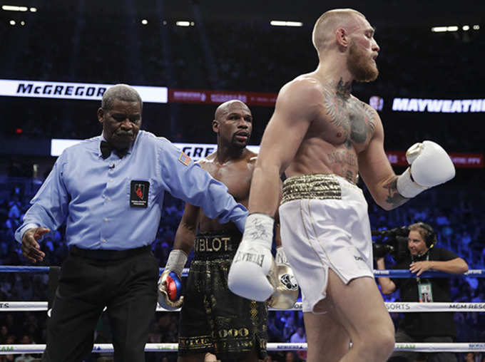 Floyd Mayweather Jr. knocks out Conor McGregor