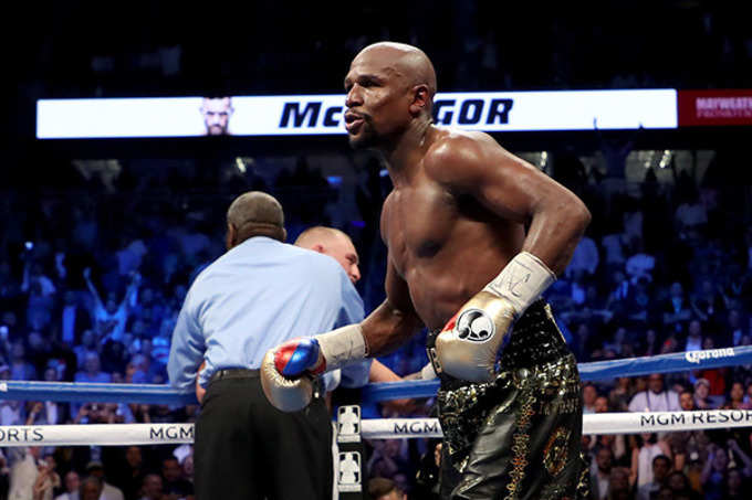 Floyd Mayweather Jr. knocks out Conor McGregor