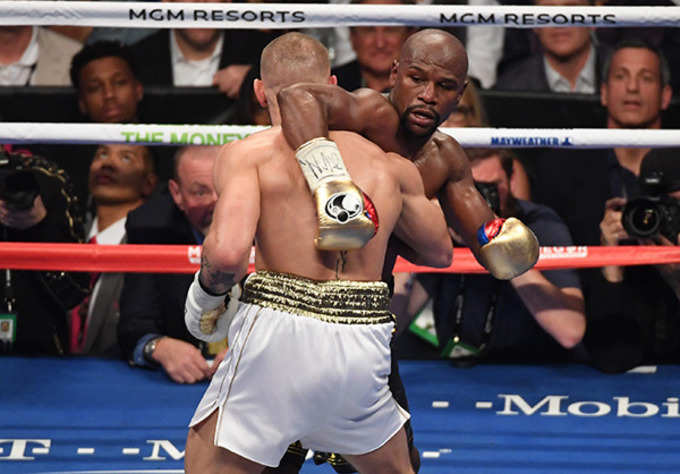 Floyd Mayweather Jr. knocks out Conor McGregor