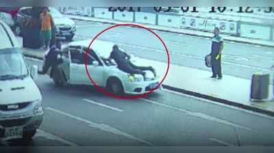 Video: બે કિલોમીટર સુધી દોડતી રહી કાર, બોનેટ પર લટકી રહ્યો ટ્રાફિક પોલીસ