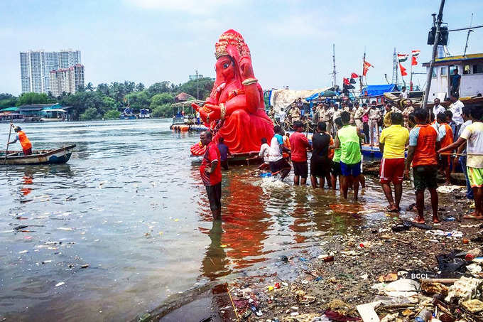 Volunteers clean up Versova beach after Ganesh Visarjan