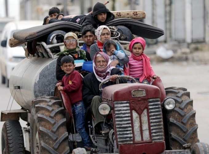 Photos of Syrian residents flee from Afrin