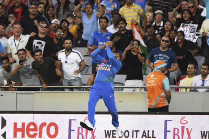 Auckland: India&#39;s Rohit Sharma takes a catch to dismiss New Zealand&#39;s Martin Gu...