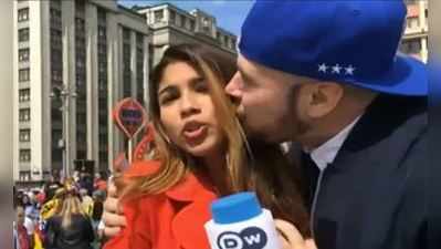 FIFA: લાઈવ રિપોર્ટિંગ દરમિયાન મહિલા રિપોર્ટરને એક યુવકે કરી Kiss, જુઓ Video