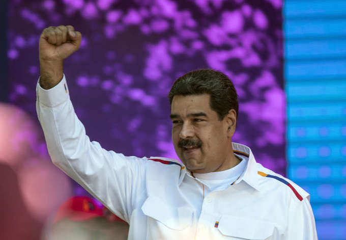 Maduro and Guaido hold competing rallies in Venezuela