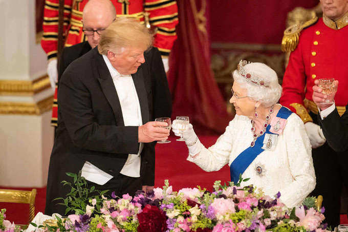 Donald Trump meets Queen Elizabeth amid protests